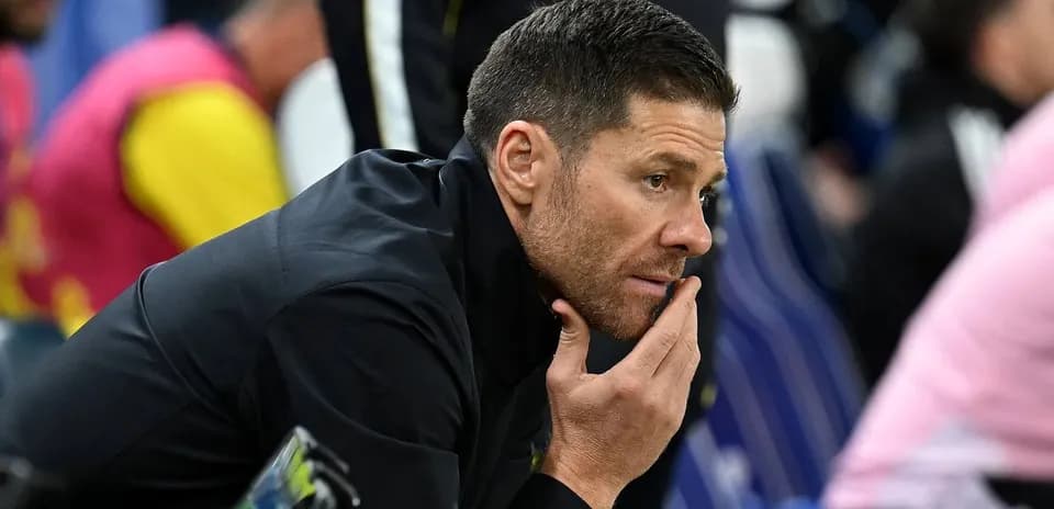 Coach observing the game from the sidelines