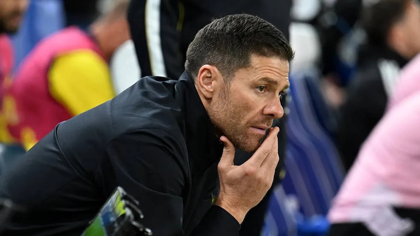 Coach observing the game from the sidelines
