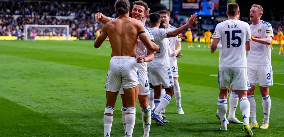 Leeds players celebrating a goal during match