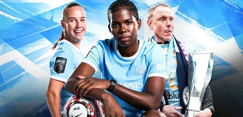 Three Manchester City players and coach with trophy