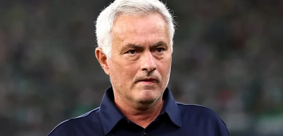 Manager observing the match from the sidelines