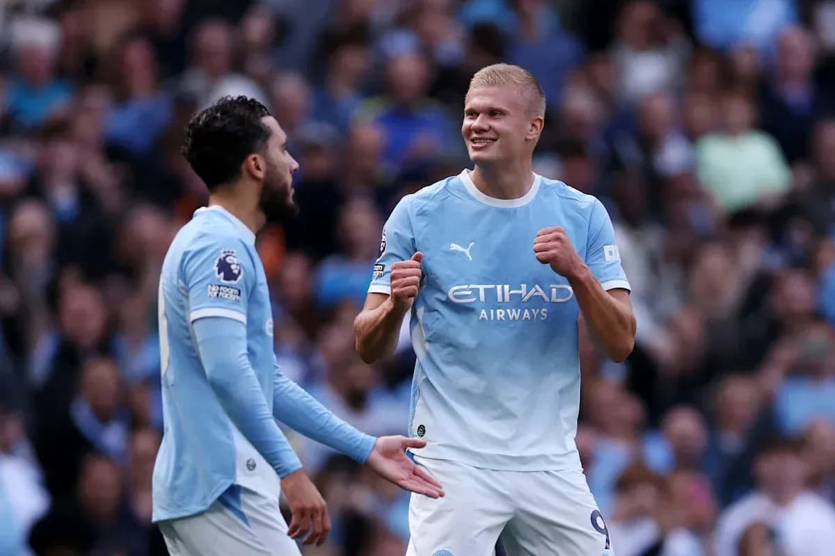 Manchester City players celebrating during a match