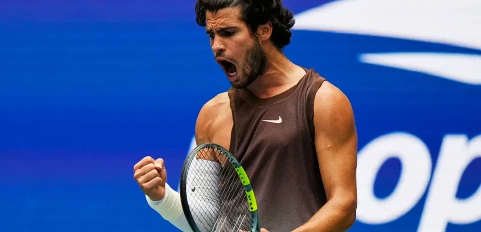 Tennis player celebrating during a match
