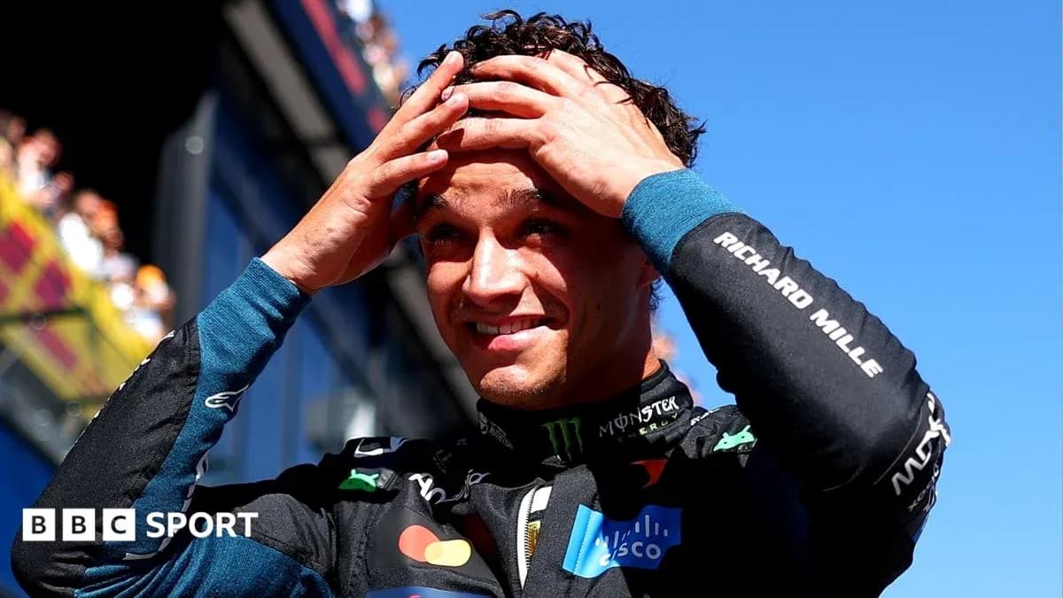 Driver celebrating after race with hands on head