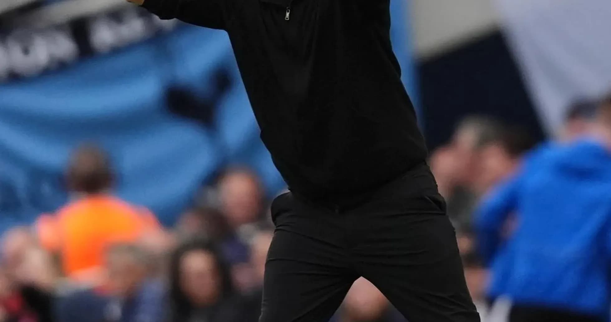 Coach gesturing during match from sideline Coach gesturing during match from sideline