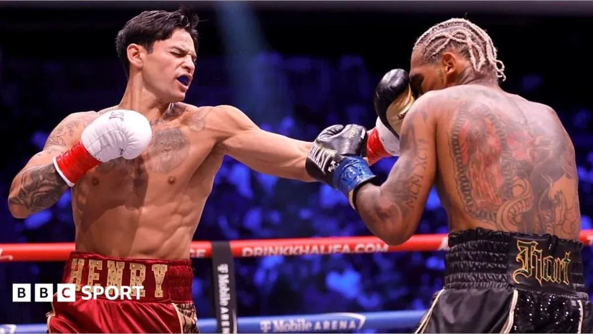 Boxer delivering a punch during a match Boxer delivering a punch during a match