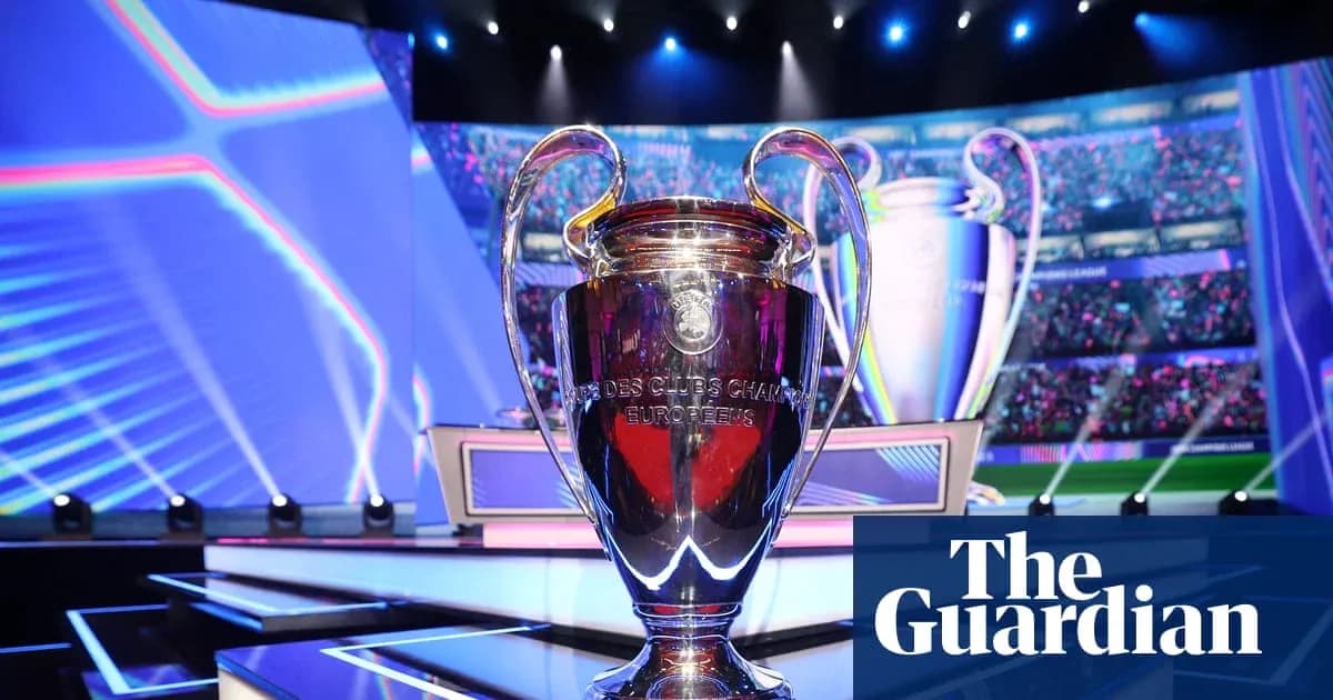 UEFA Champions League trophy on stage with lights UEFA Champions League trophy on stage with lights