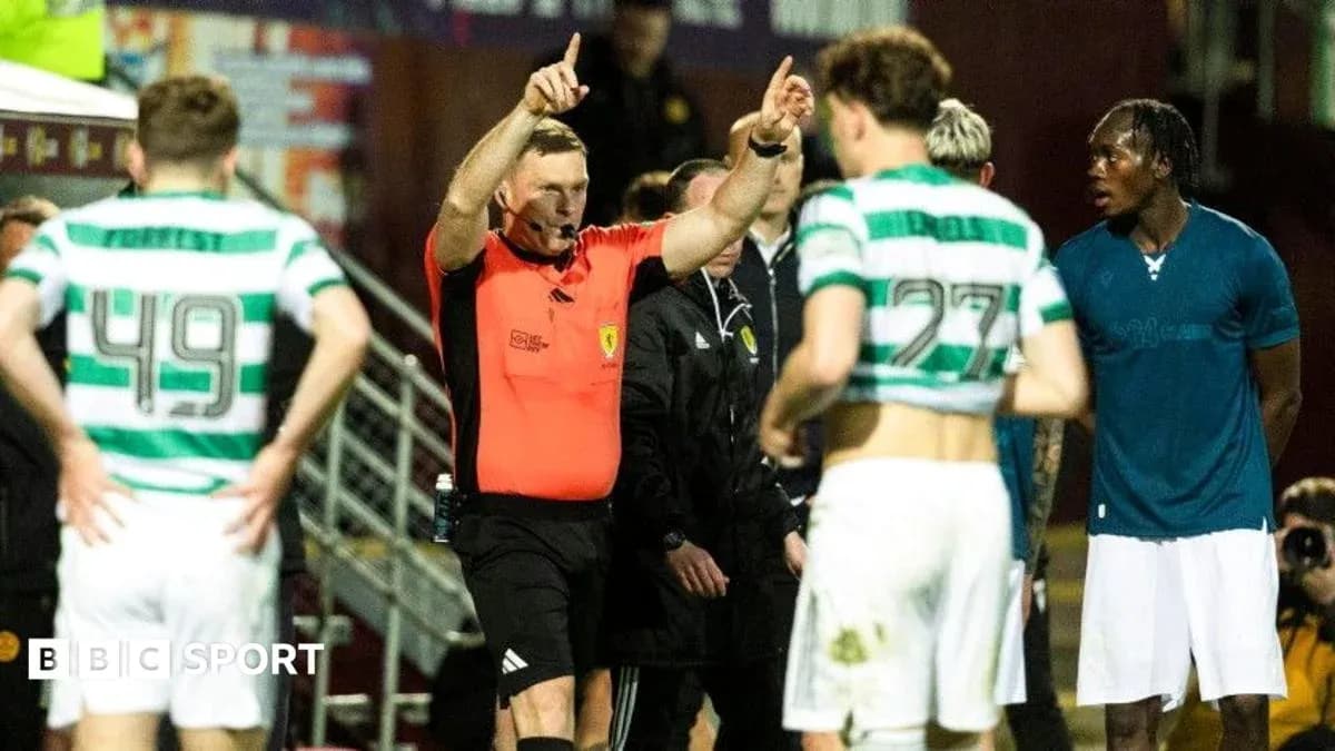 Referee signaling during a football match incident Referee signaling during a football match incident