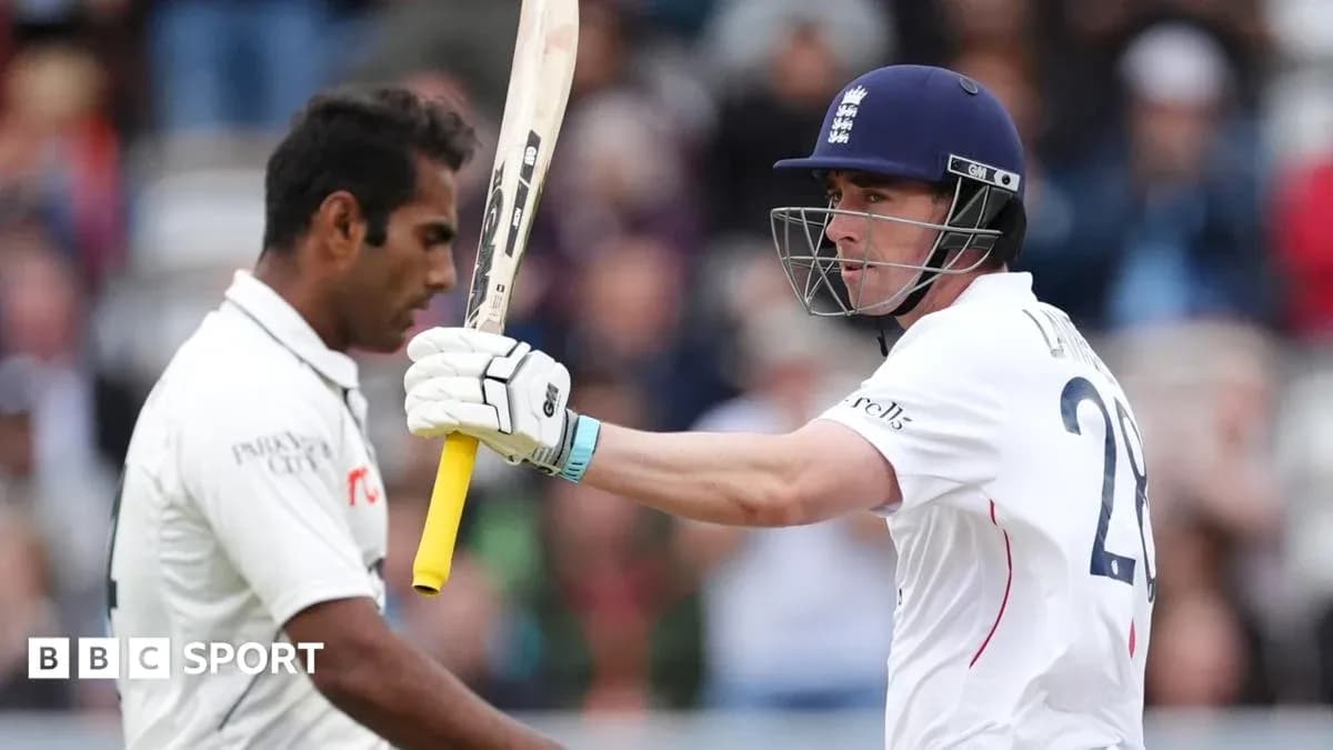 Batsman celebrating while bowler looks on during match Batsman celebrating while bowler looks on during match