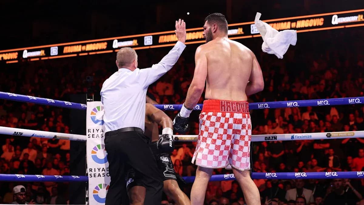 Referee stopping the boxing match with a towel Referee stopping the boxing match with a towel
