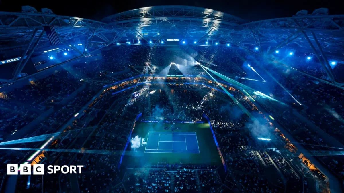 Aerial view of a tennis match in stadium at night Aerial view of a tennis match in stadium at night