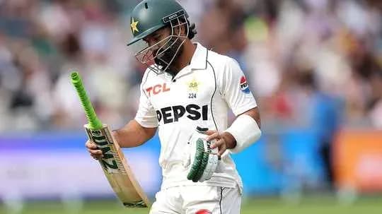 Batsman walking off field after dismissal in cricket Batsman walking off field after dismissal in cricket
