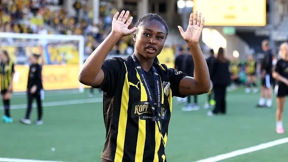 Player waving after winning the match on field Player waving after winning the match on field