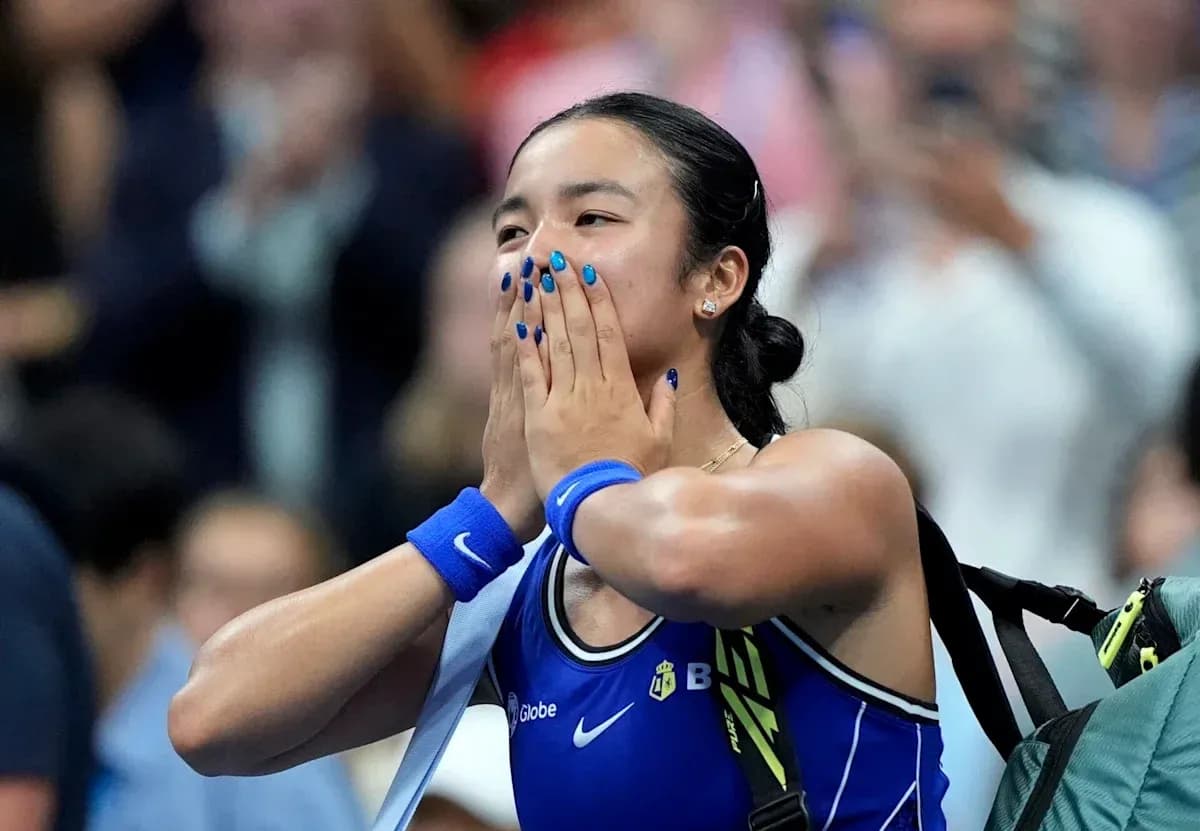 Tennis player celebrating with hands on face Tennis player celebrating with hands on face