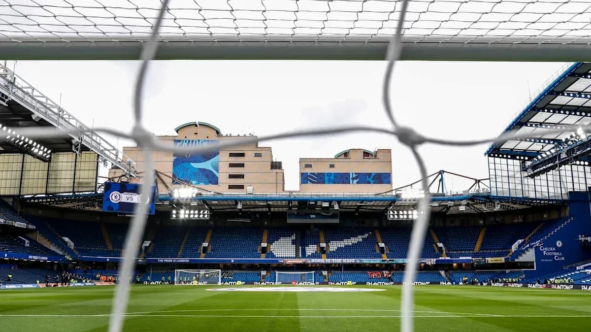 View of Stamford Bridge stadium through goal netting View of Stamford Bridge stadium through goal netting