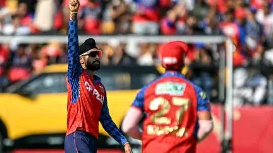 Bowler celebrating wicket during cricket match Bowler celebrating wicket during cricket match