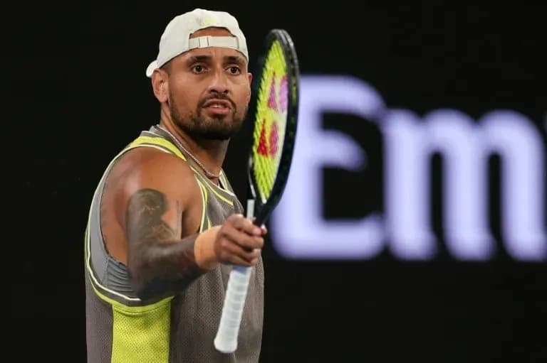 Tennis player holding racket during match Tennis player holding racket during match