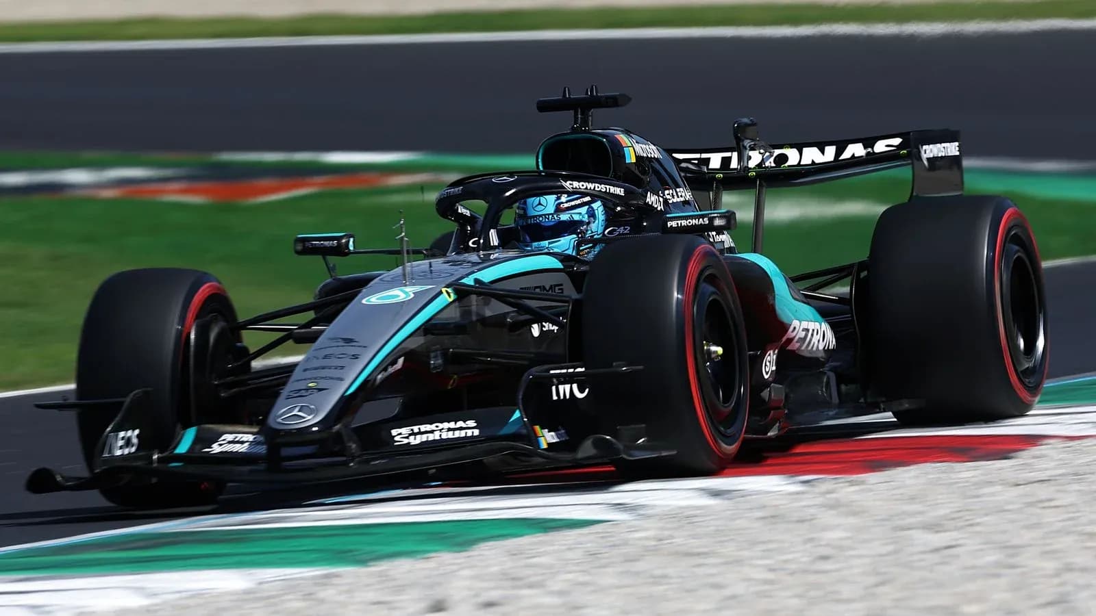 Mercedes Formula 1 car racing on track Mercedes Formula 1 car racing on track