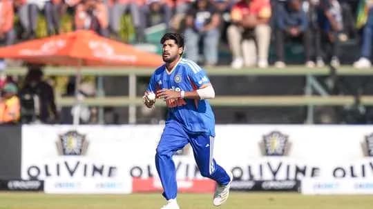 Bowler running on field during cricket match Bowler running on field during cricket match