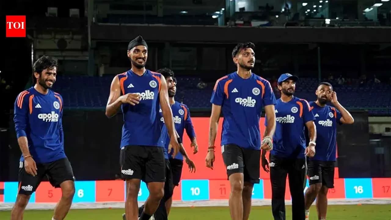 Cricket team walking off the field after practice Cricket team walking off the field after practice