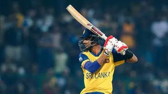 Batsman from Sri Lanka preparing to hit ball Batsman from Sri Lanka preparing to hit ball