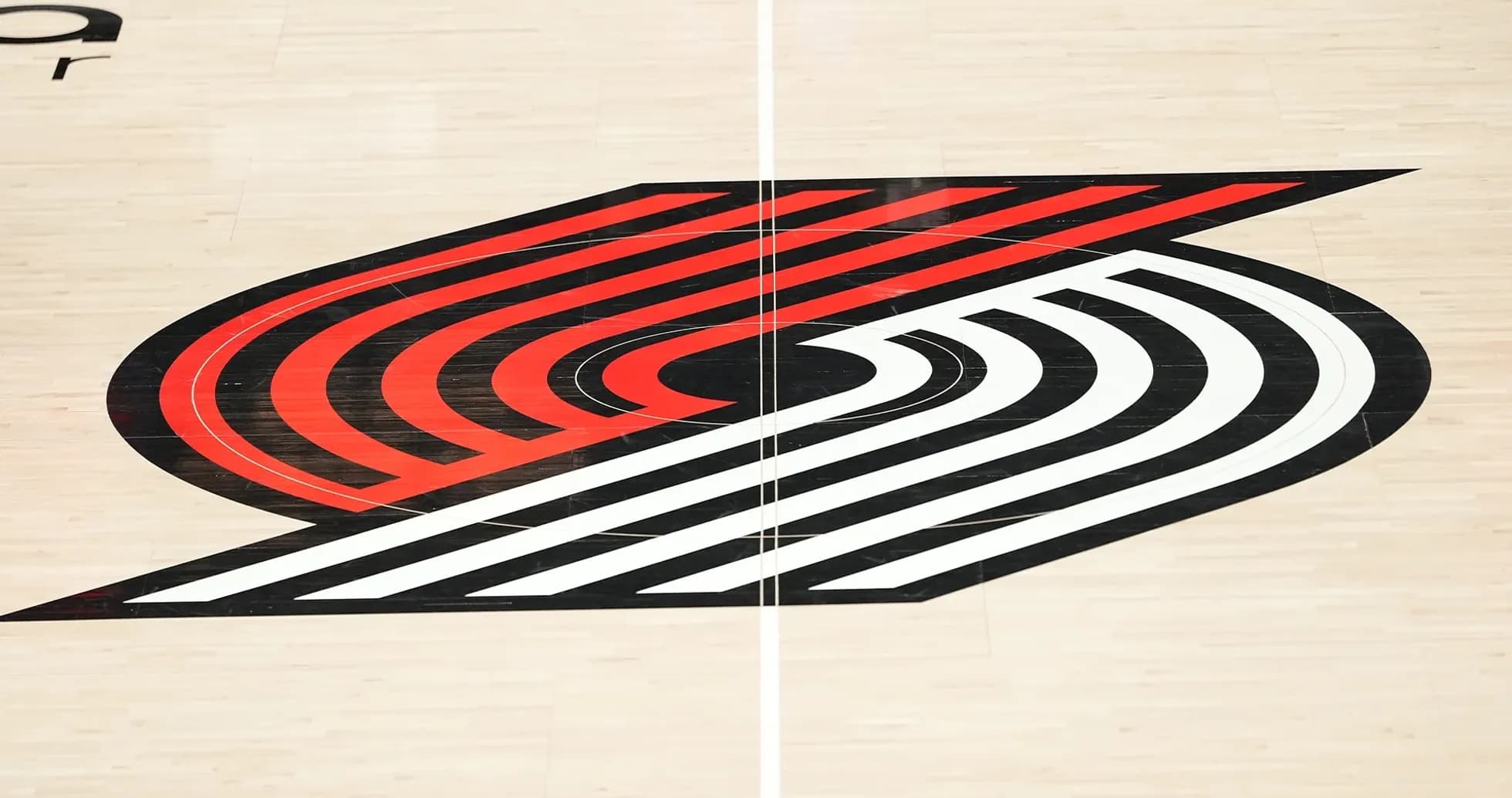 Portland Trail Blazers logo on basketball court Portland Trail Blazers logo on basketball court
