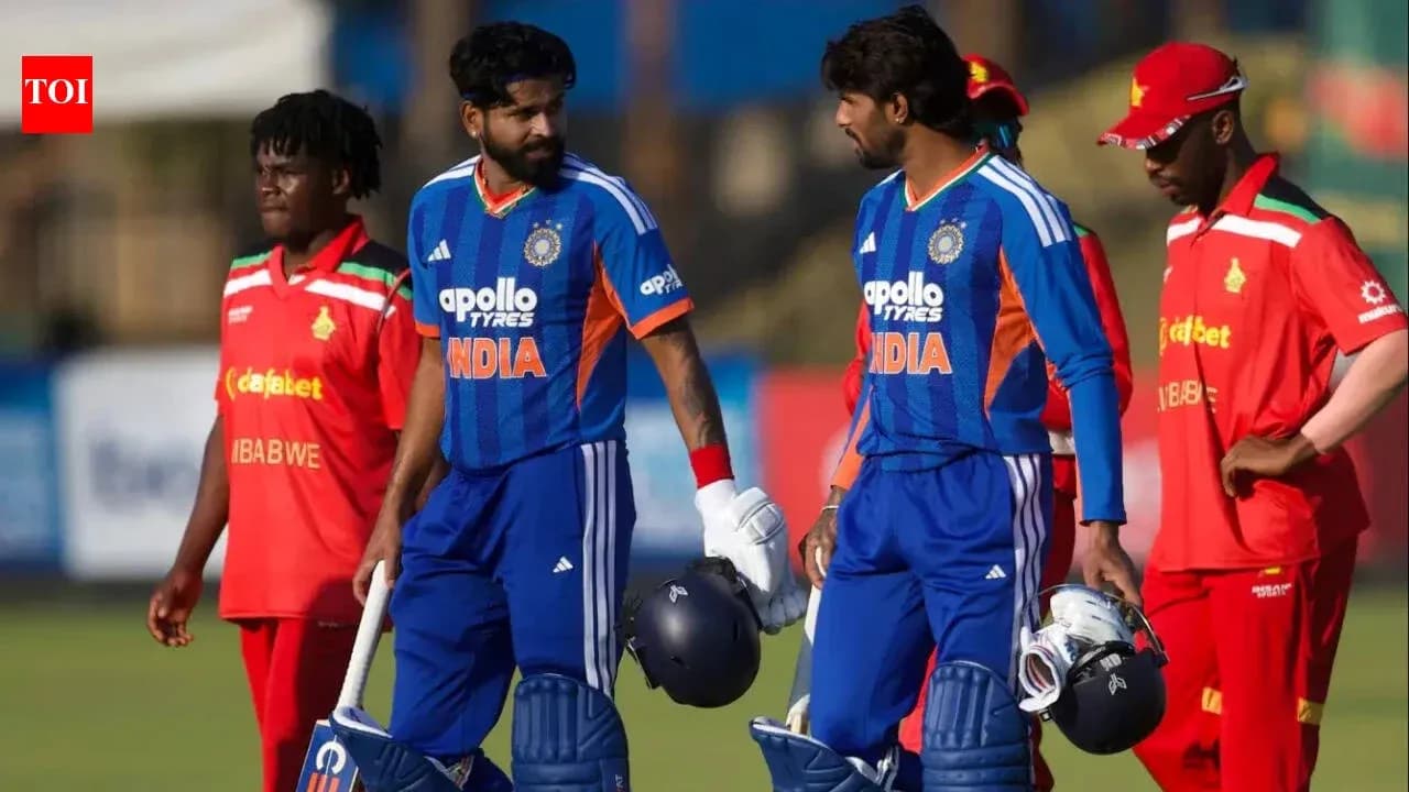 Indian and Zimbabwean players during cricket match Indian and Zimbabwean players during cricket match