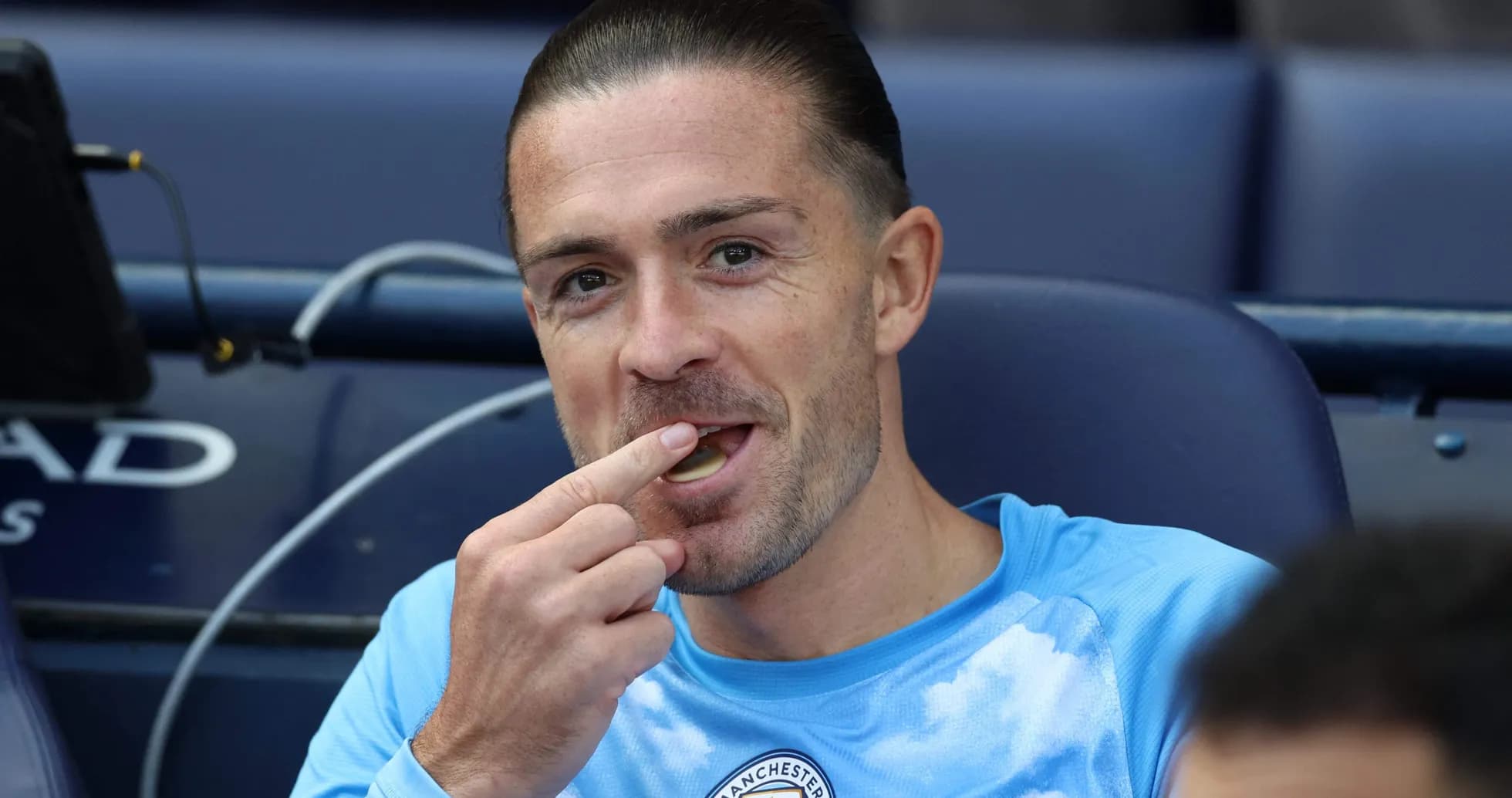 Player eating on the bench during a match Player eating on the bench during a match