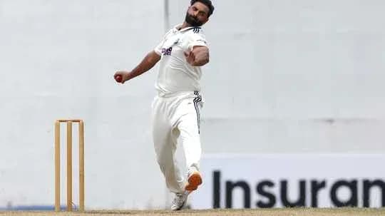 Bowler delivering a ball in a cricket match Bowler delivering a ball in a cricket match