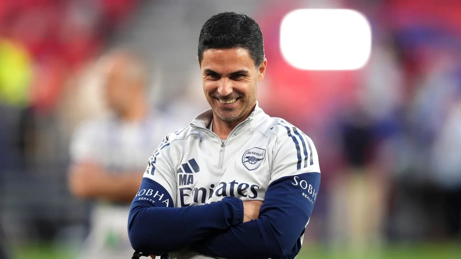 Arsenal manager smiling during warm-up session Arsenal manager smiling during warm-up session