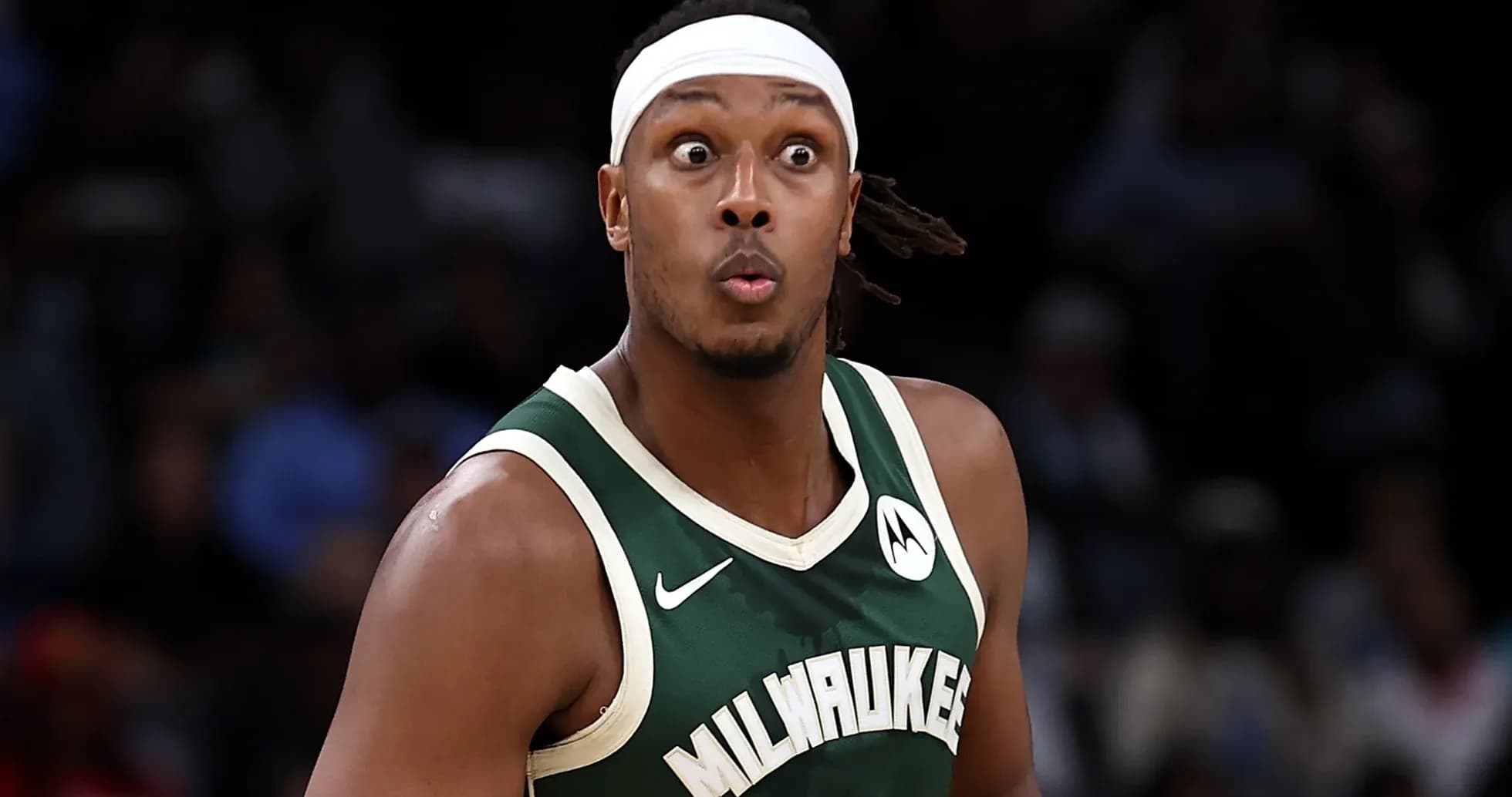 Player in Milwaukee Bucks uniform during game action Player in Milwaukee Bucks uniform during game action