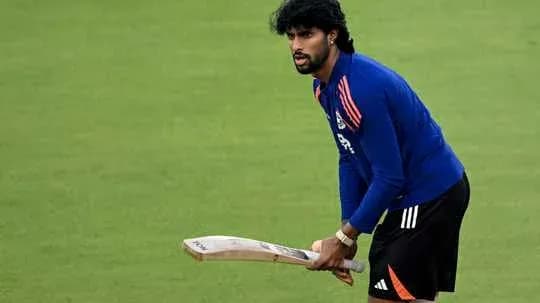 Player practicing with bat during training session Player practicing with bat during training session