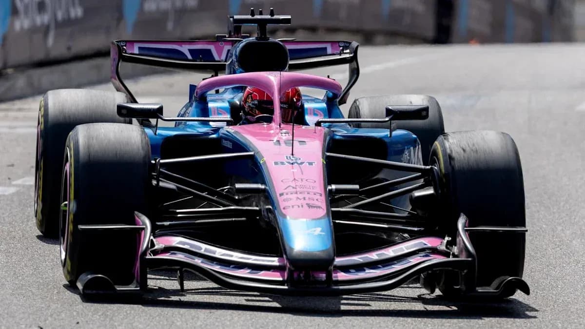 Race car competing on track during Formula 1 event Race car competing on track during Formula 1 event